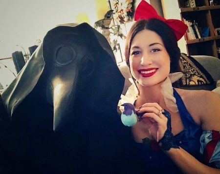 She is posing for a photo.